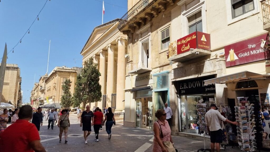 Valletta street with people in May
