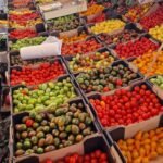 TorvehallerneKBH Food Market Copenhagen: What to Eat + Tips (Near Nørreport) Colorful tomatoes at TorvehallerneKBH