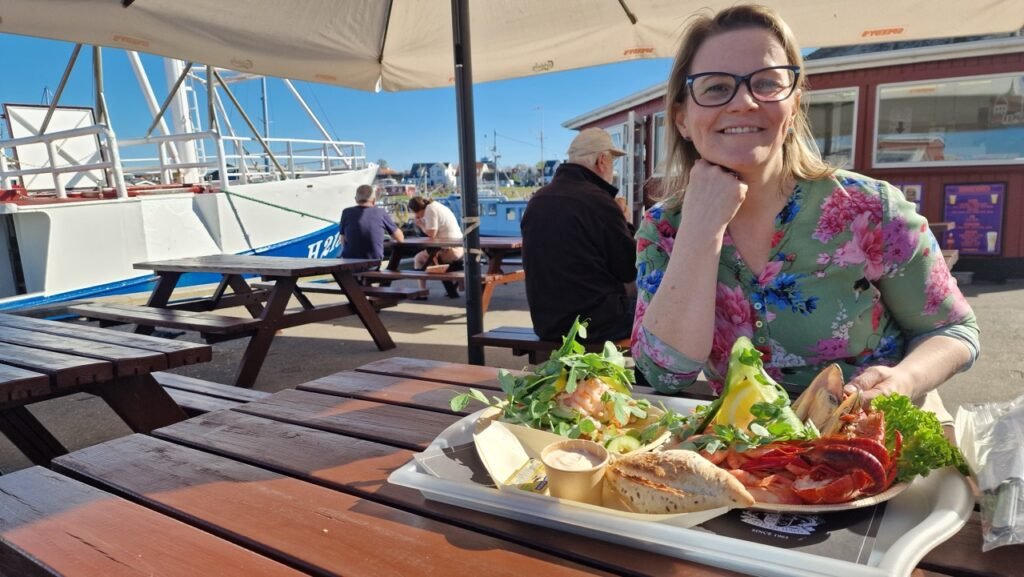 Adamsens Deli and harbor boats with Szilvi